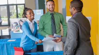 Job seekers atttending an in-person job fair. 