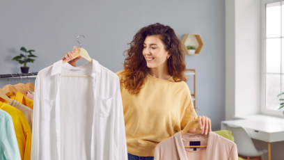 A woman choosing her clothing for an interview. 