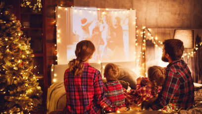 Family watching holiday movies together