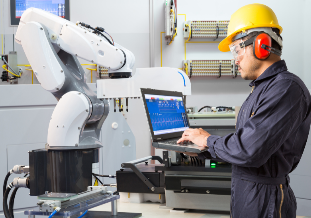 Manufacturing engineer working on computer