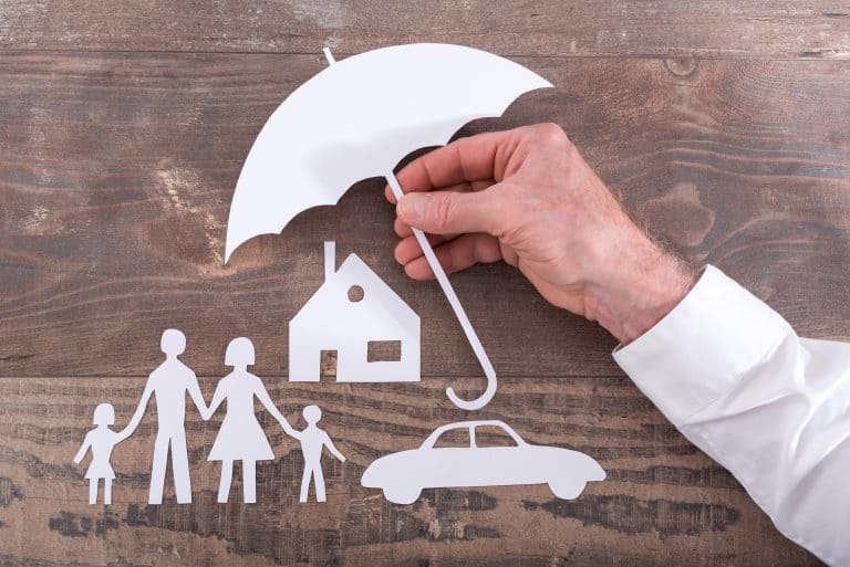 Family, house, and car protected by umbrella insurance